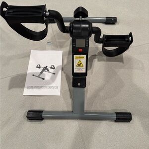 Compact Black and Gray Pedal Exerciser